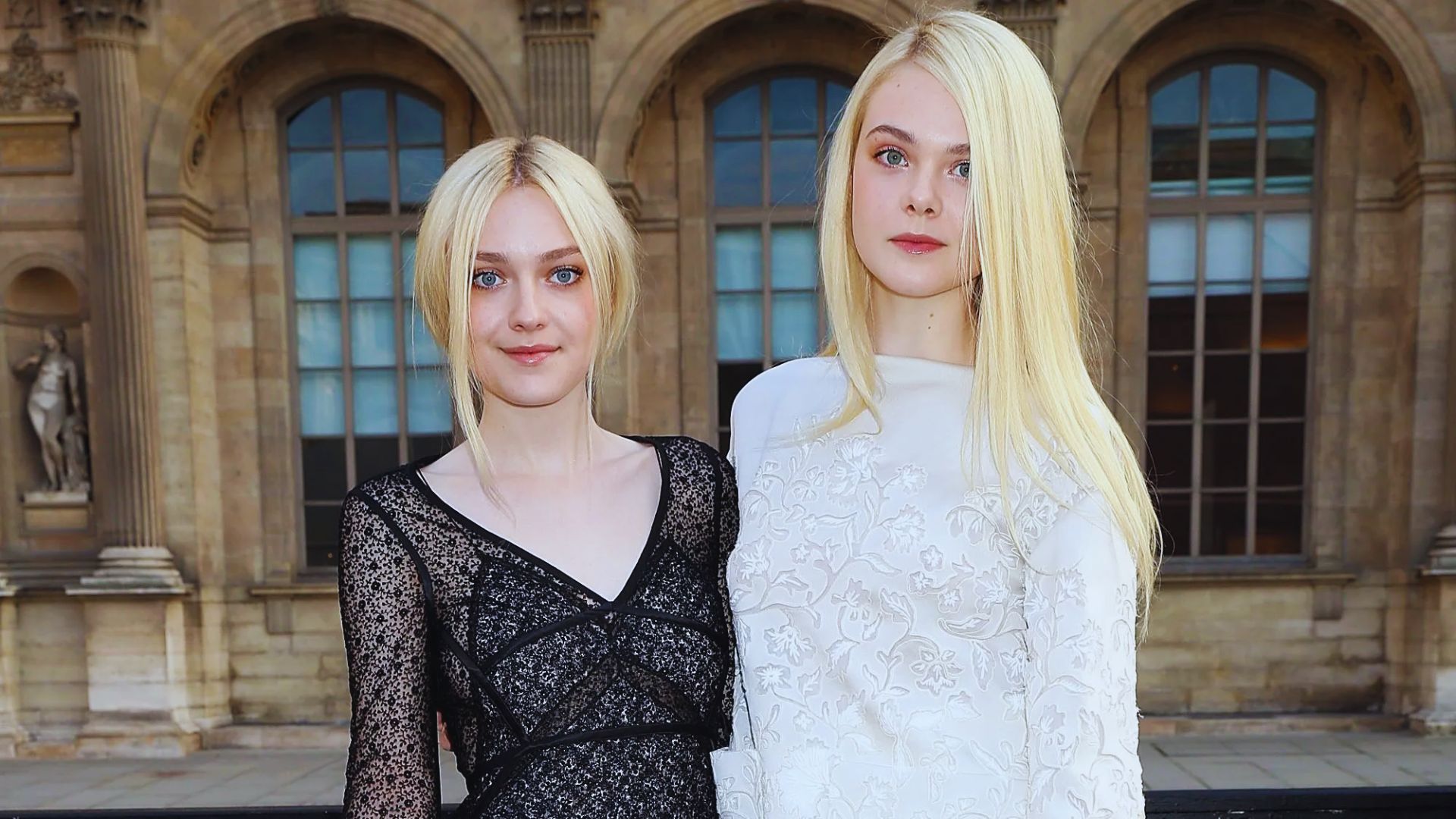 Dakota Fanning and Elle Fanning stand together, showcasing their roles as sisters in The Nightingale film.
