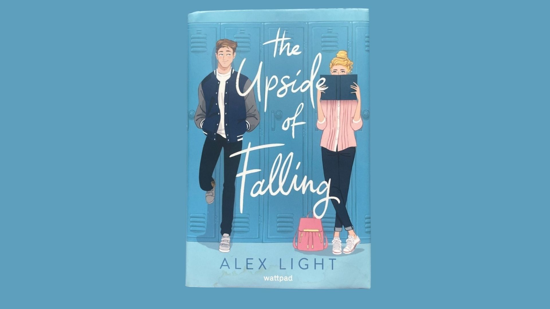 The cover of "The Inside of Falling," displaying an artistic design with gentle hues and abstract elements.