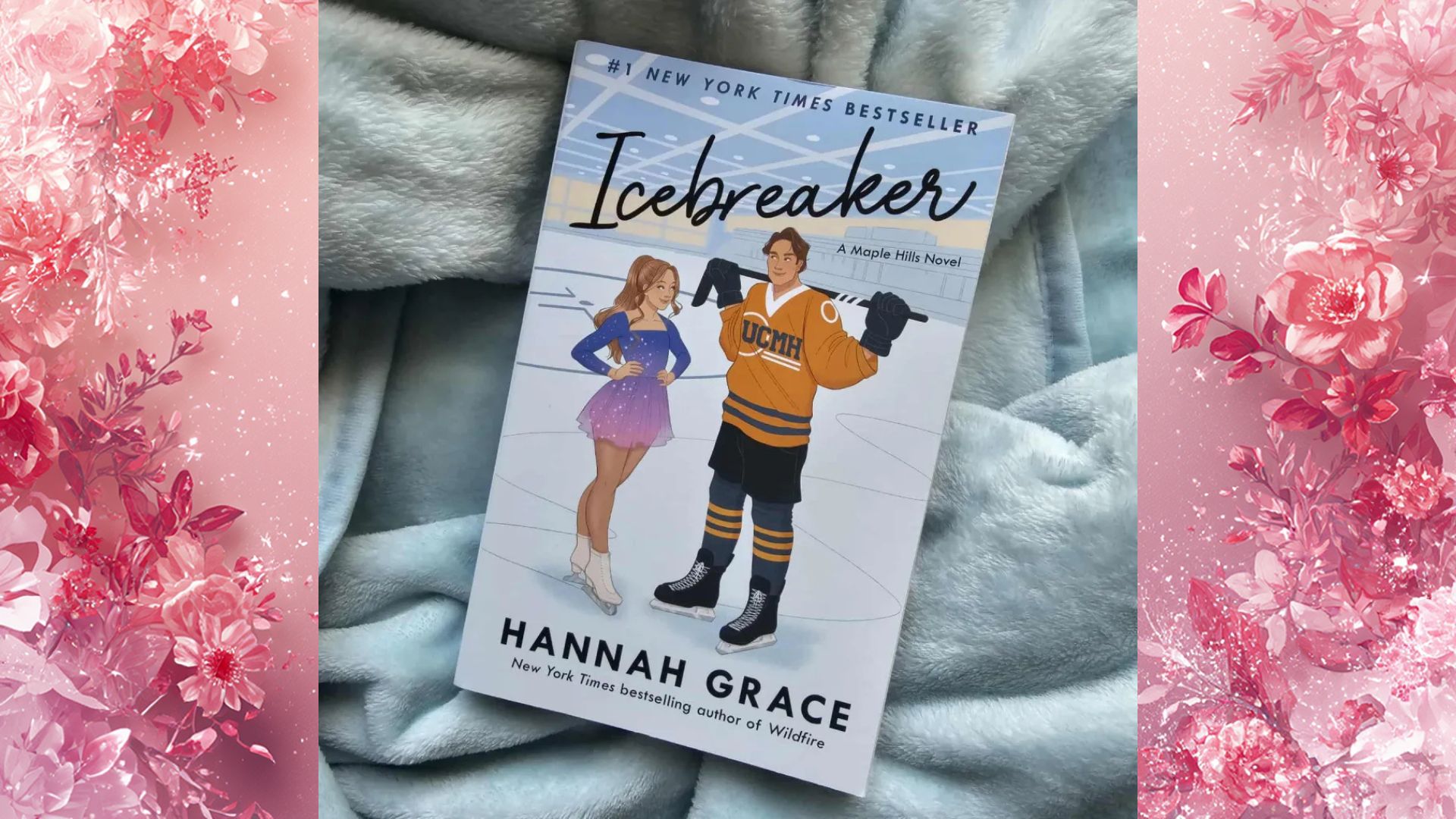 Cover of "Icebreaker" by Hannah Grace, featuring a snowy landscape and a couple embracing warmly.