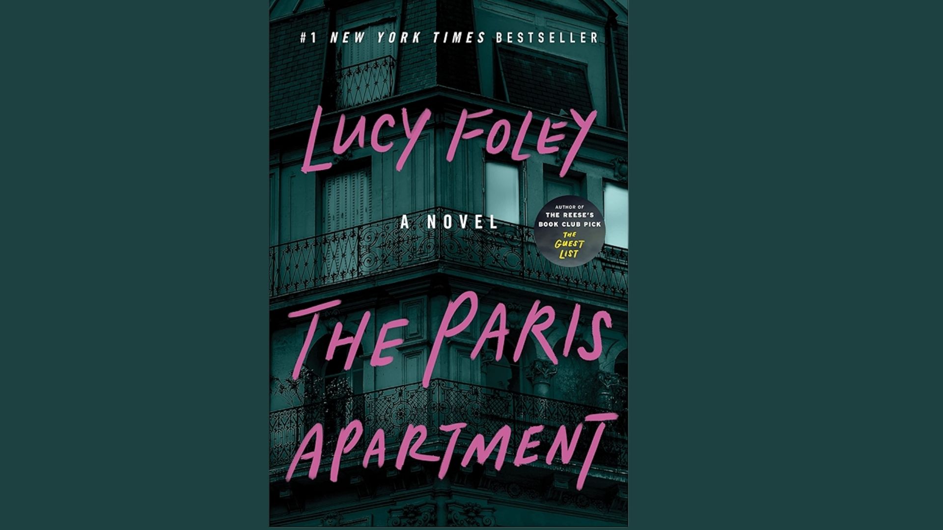 Cover of "The Paris Apartment" by Lucy Foley features a dimly lit, eerie Parisian building with bold pink handwritten title text overlaying the facade.