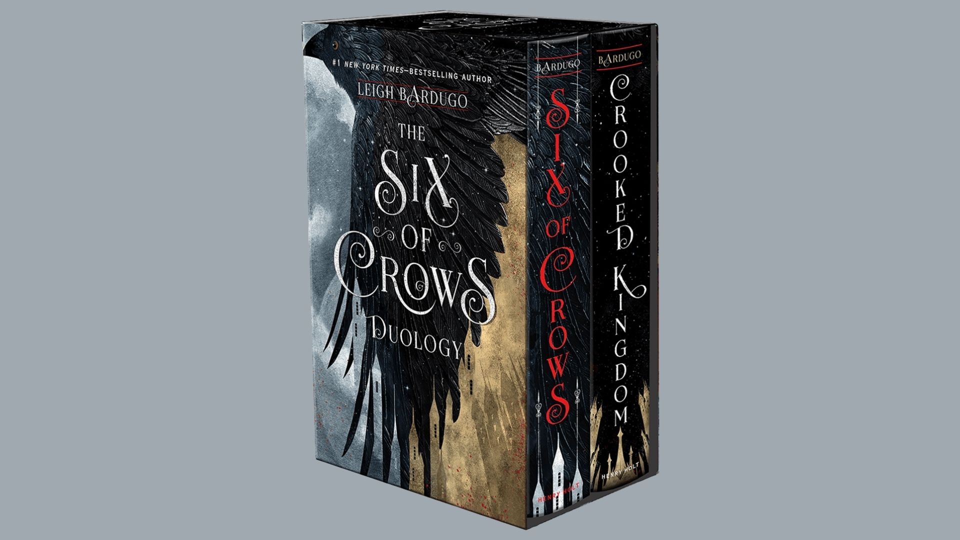 Boxed set of "Six of Crows" duology by Leigh Bardugo features a crow with dark wings against a moody, cloudy sky, conveying a mysterious tone.