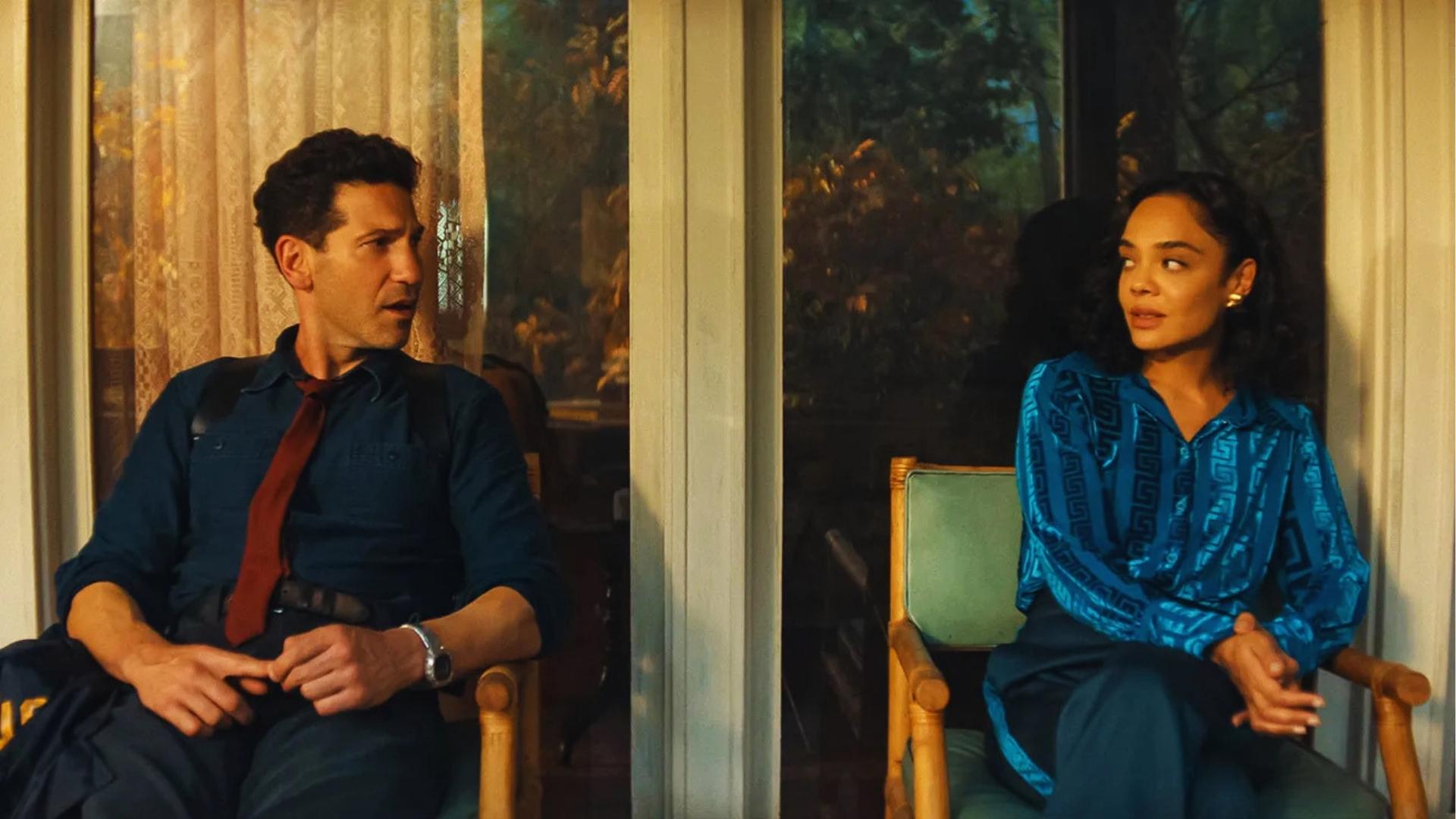 Netflix His & Hers scene Jon Bernthal and Tessa Thompson in tense porch conversation at dusk