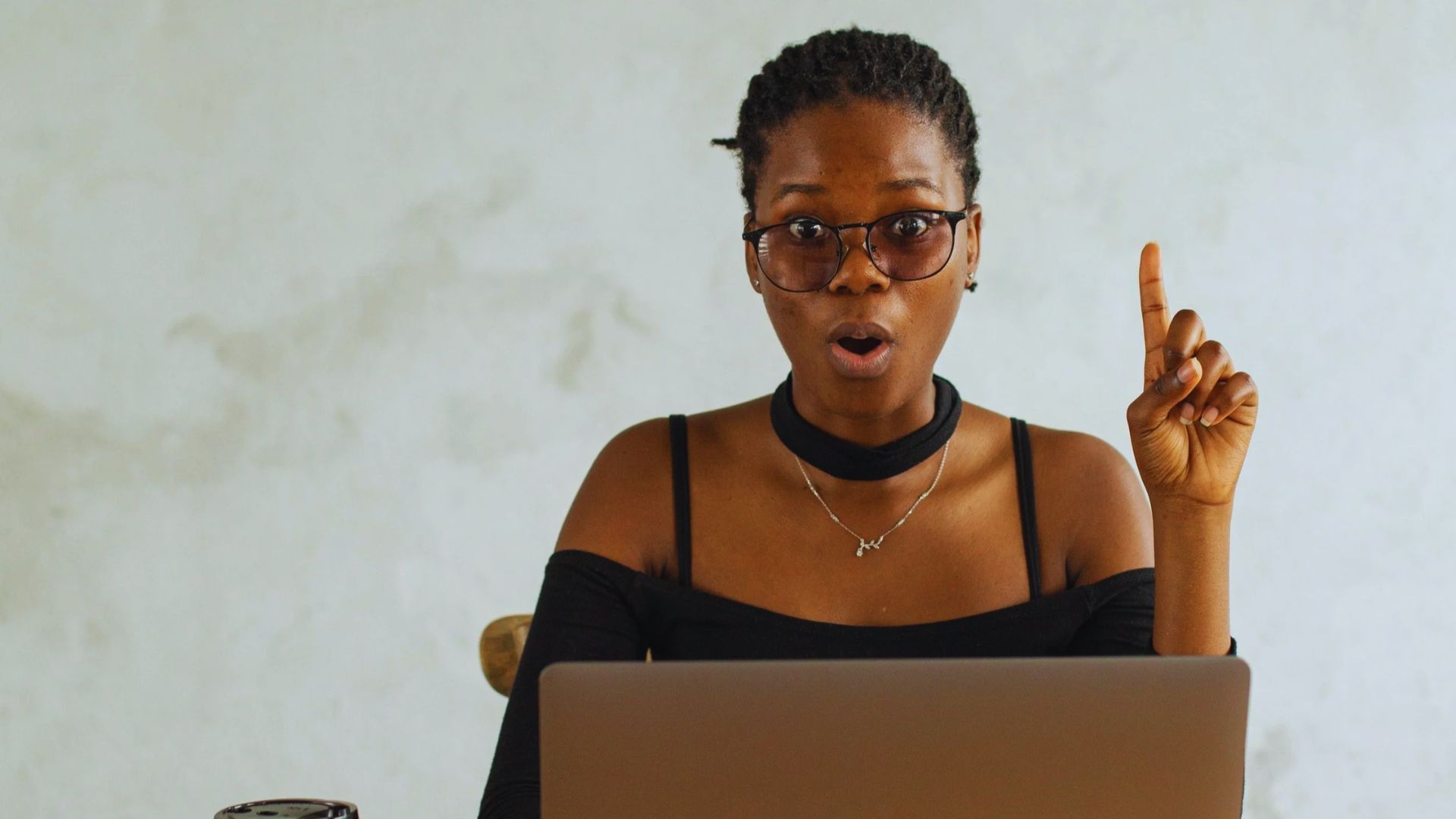 Girl working on a laptop, representing studying, remote work, or online learning.