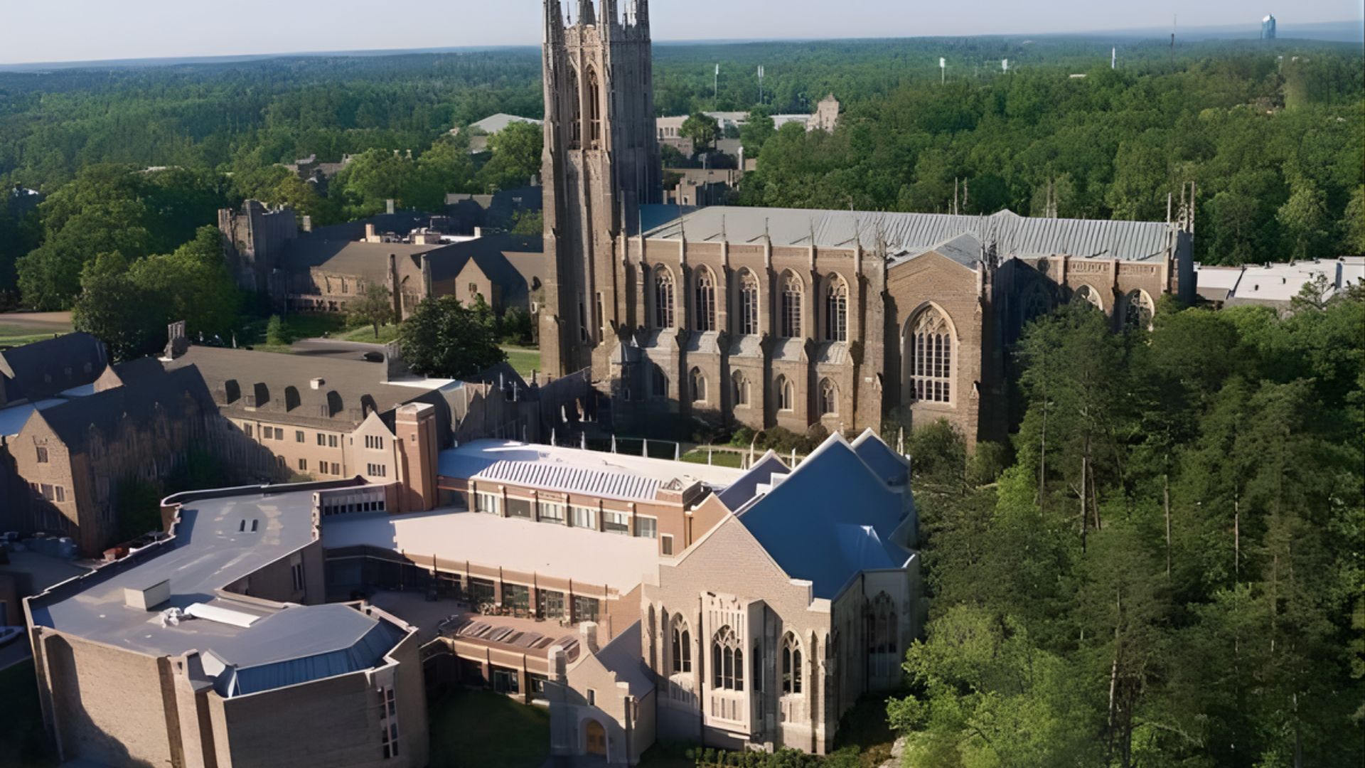 Aerial view of a large building with a prominent tower, representing Duke University's Quantitative Finance program.