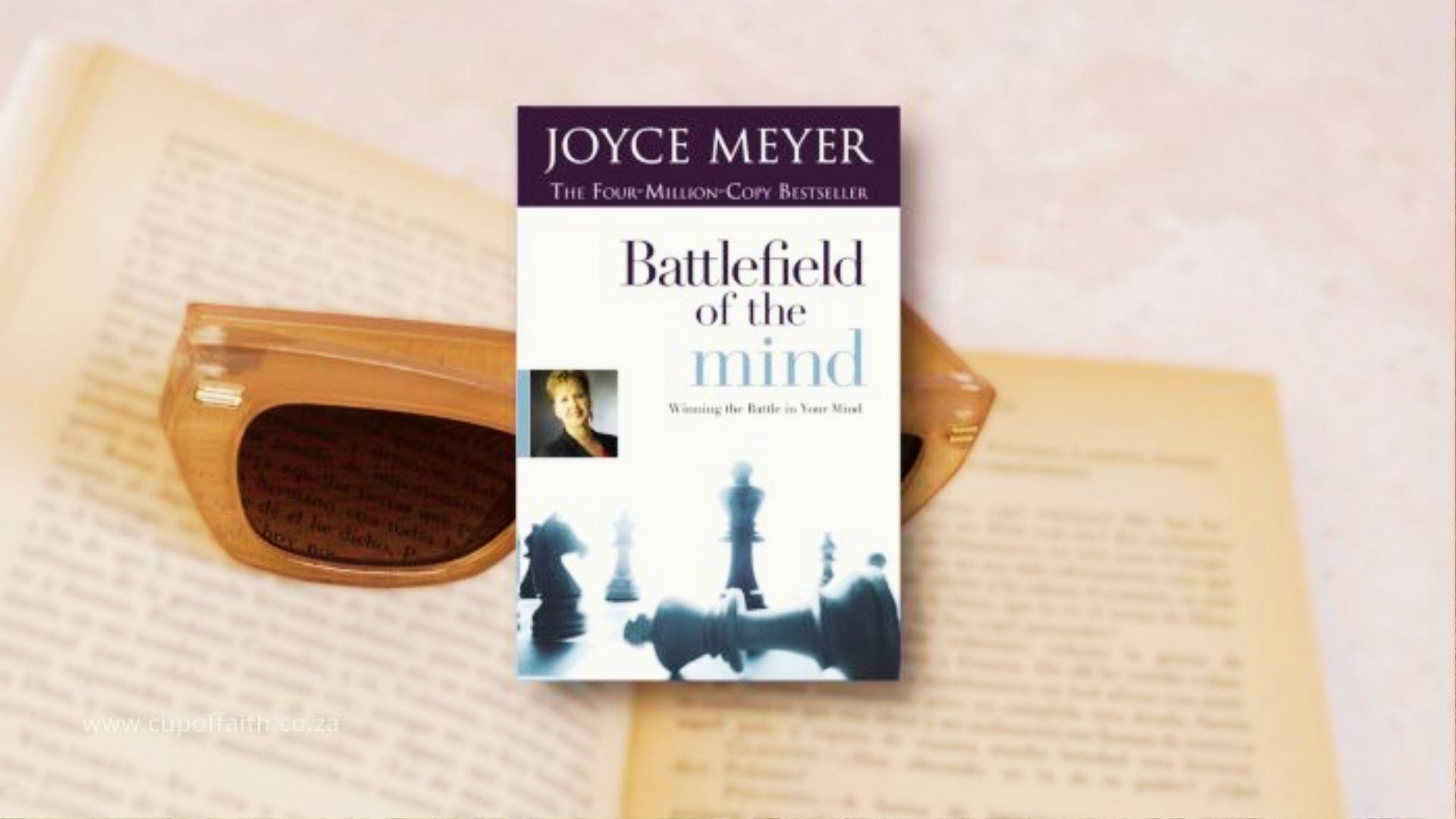 Cover of Joyce Meyer's "Battlefield of the Mind," featuring a serene landscape and bold title text.