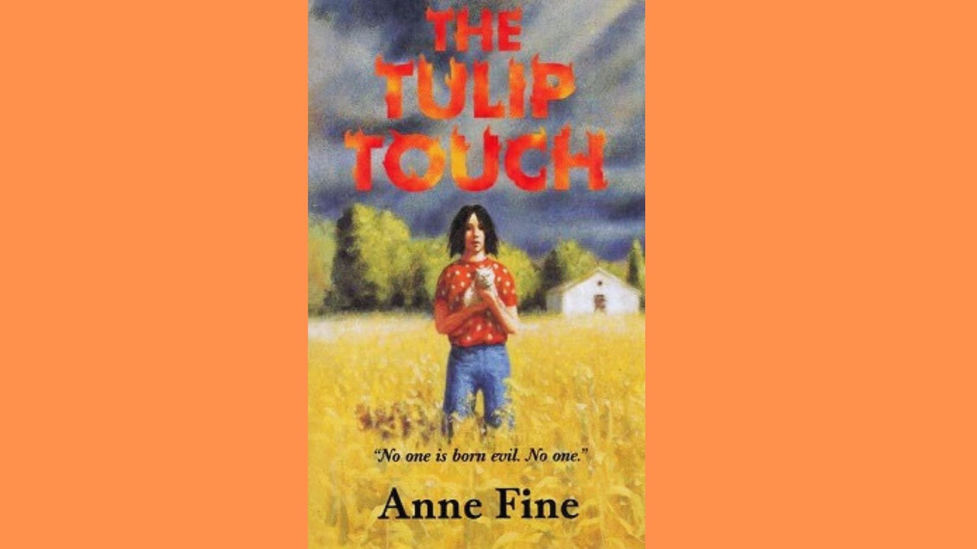 The Tulip Touch cover featuring a girl holding white cat in a golden wheat field under dark clouds.