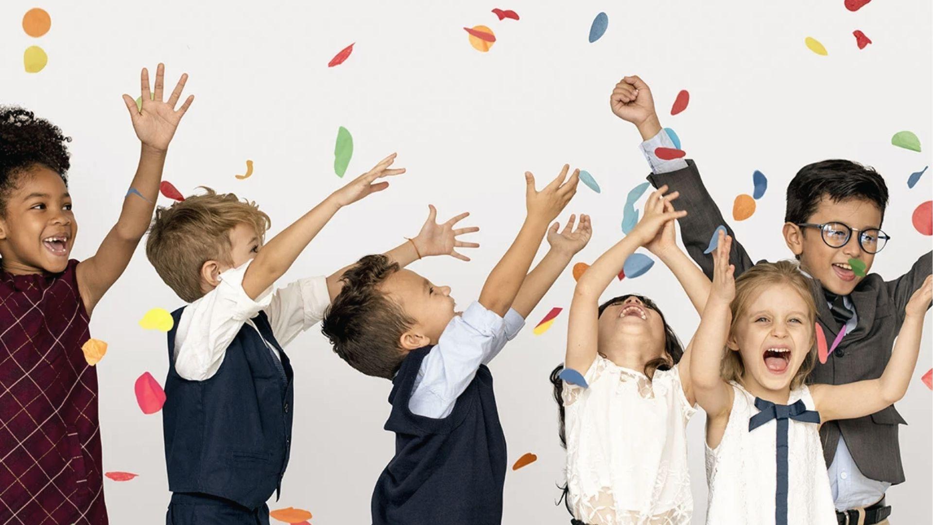 Diverse kids throw confetti and cheer, showing reward breaks help you stay motivated with homework.