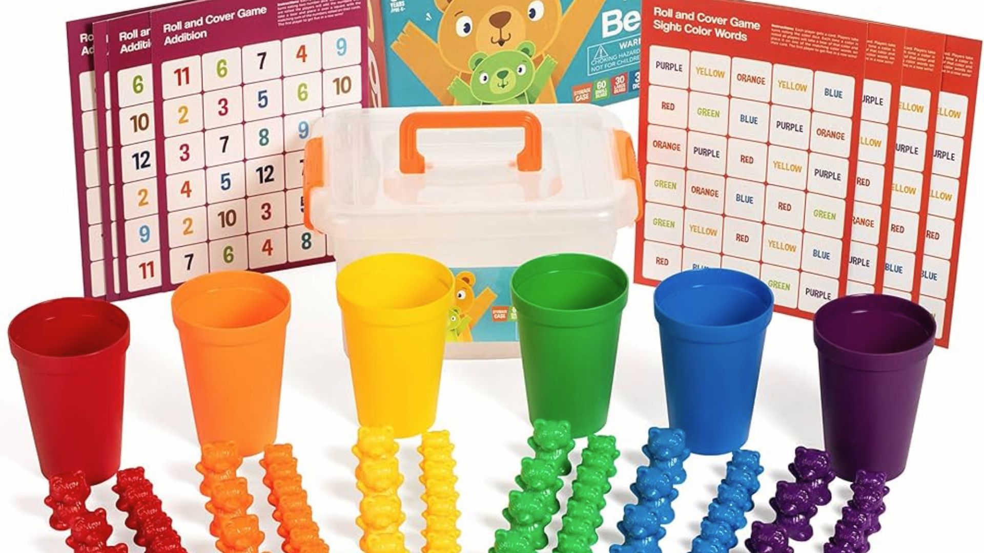 Rainbow-colored bear counters and cups are set up with addition and color word game cards.