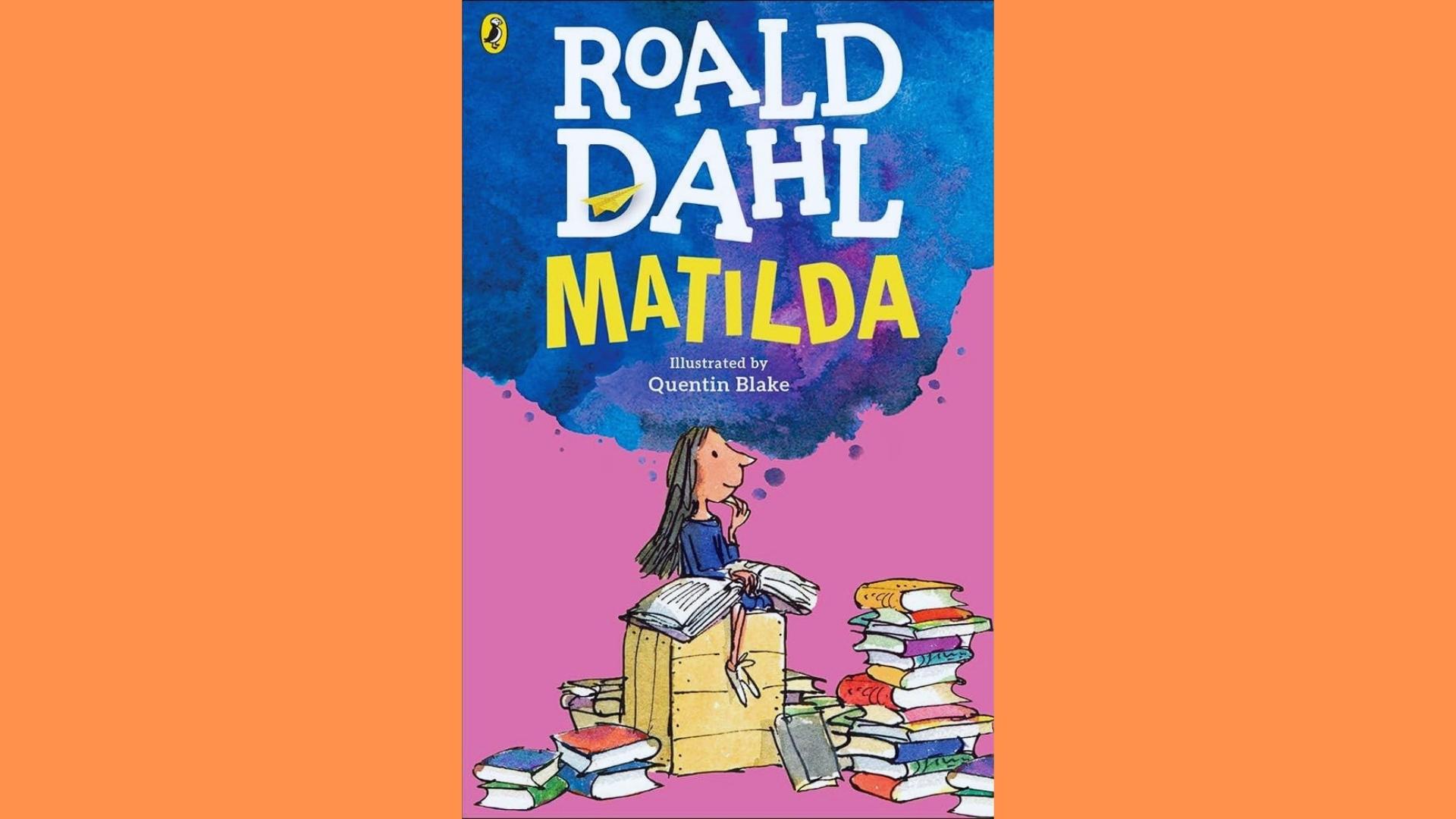 Matilda by Roald Dahl cover showing illustrated girl reading books on crate surrounded by stacks.