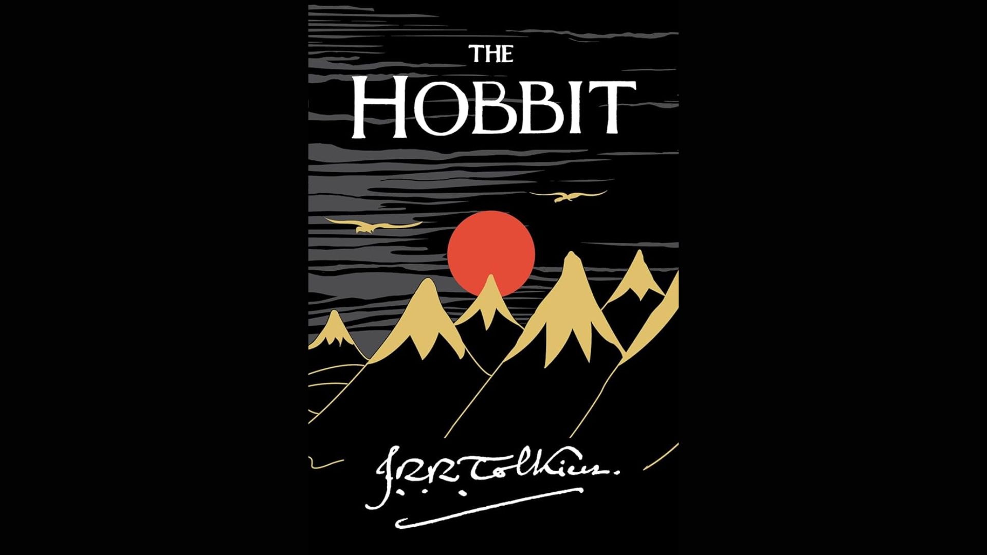 Cover of The Hobbit, featuring a mountainous landscape that symbolize adventure and fantasy