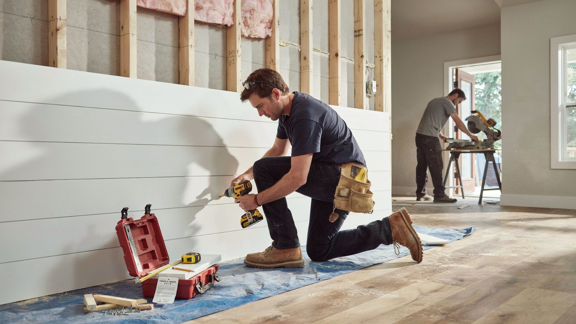Preparing a wall surface before installing shiplap boards.