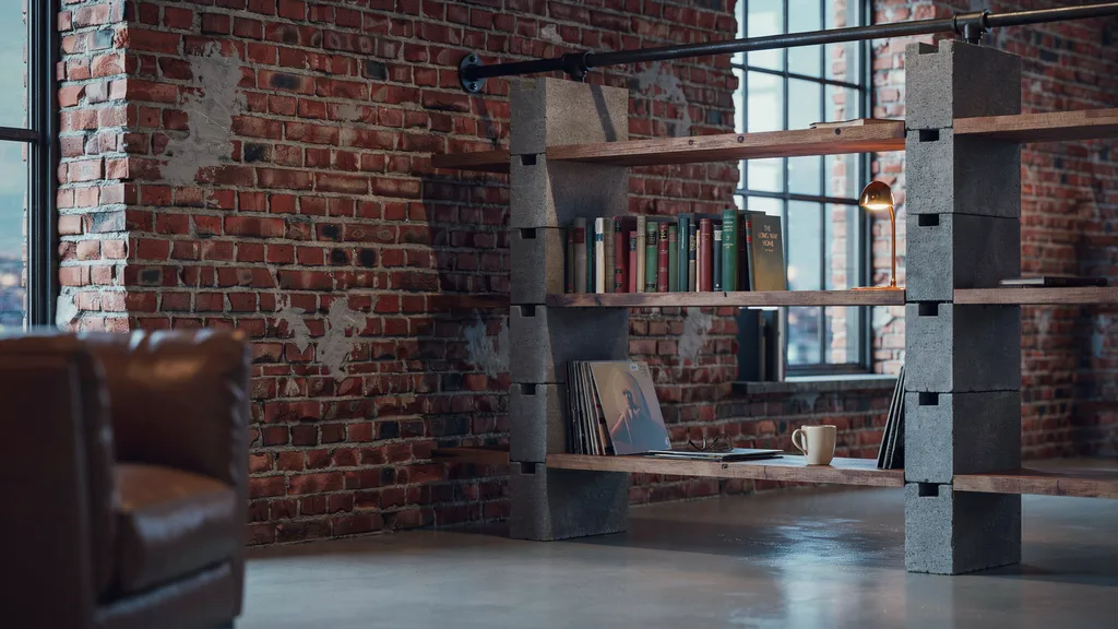 Industrial cinder block bookshelf with dark wood shelves in loft interior
